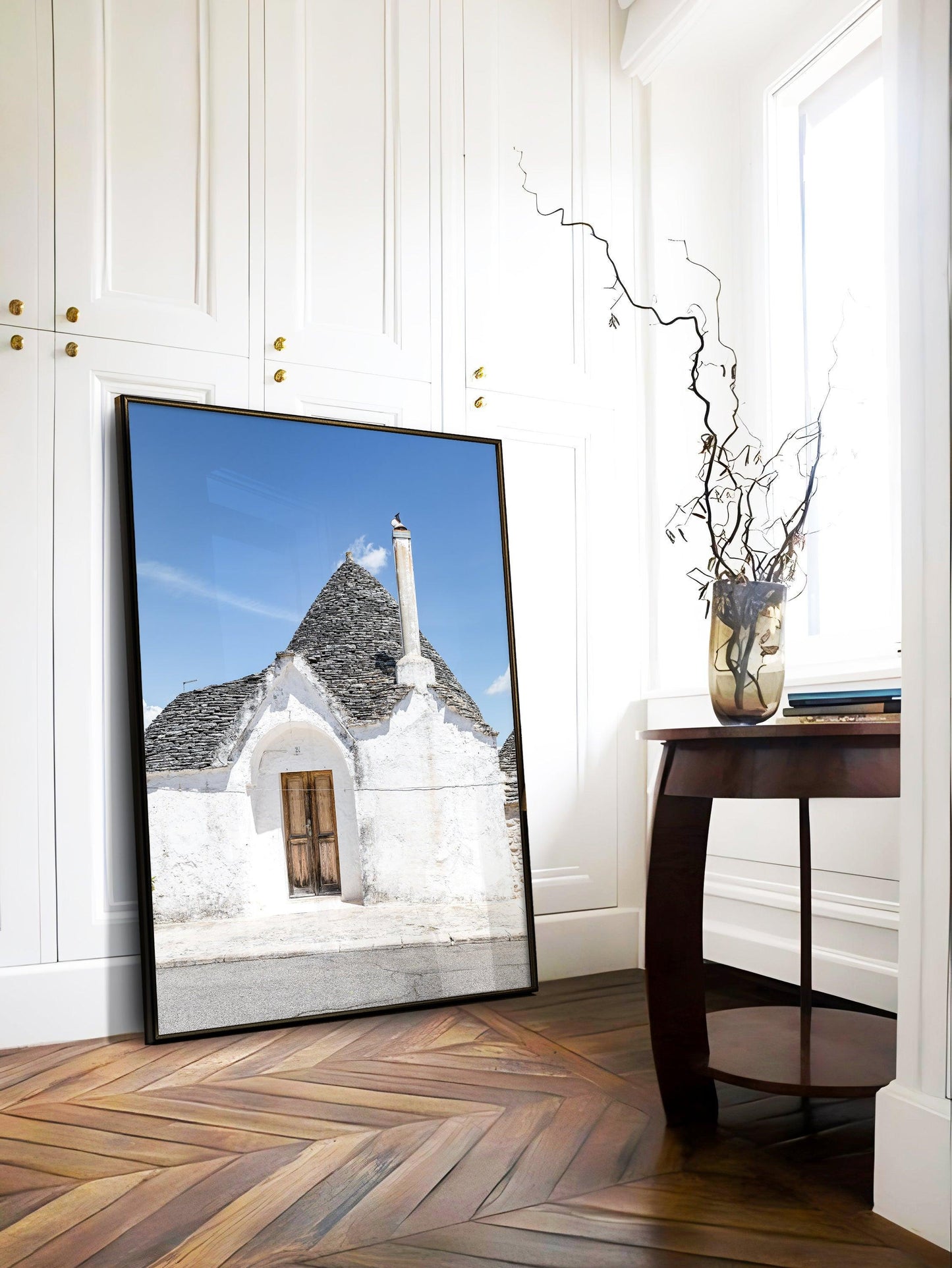 Vertical photo of trullo doorway and rooftop in Alberobello, Italy with stucco walls and blue sky – Mediterranean wall art