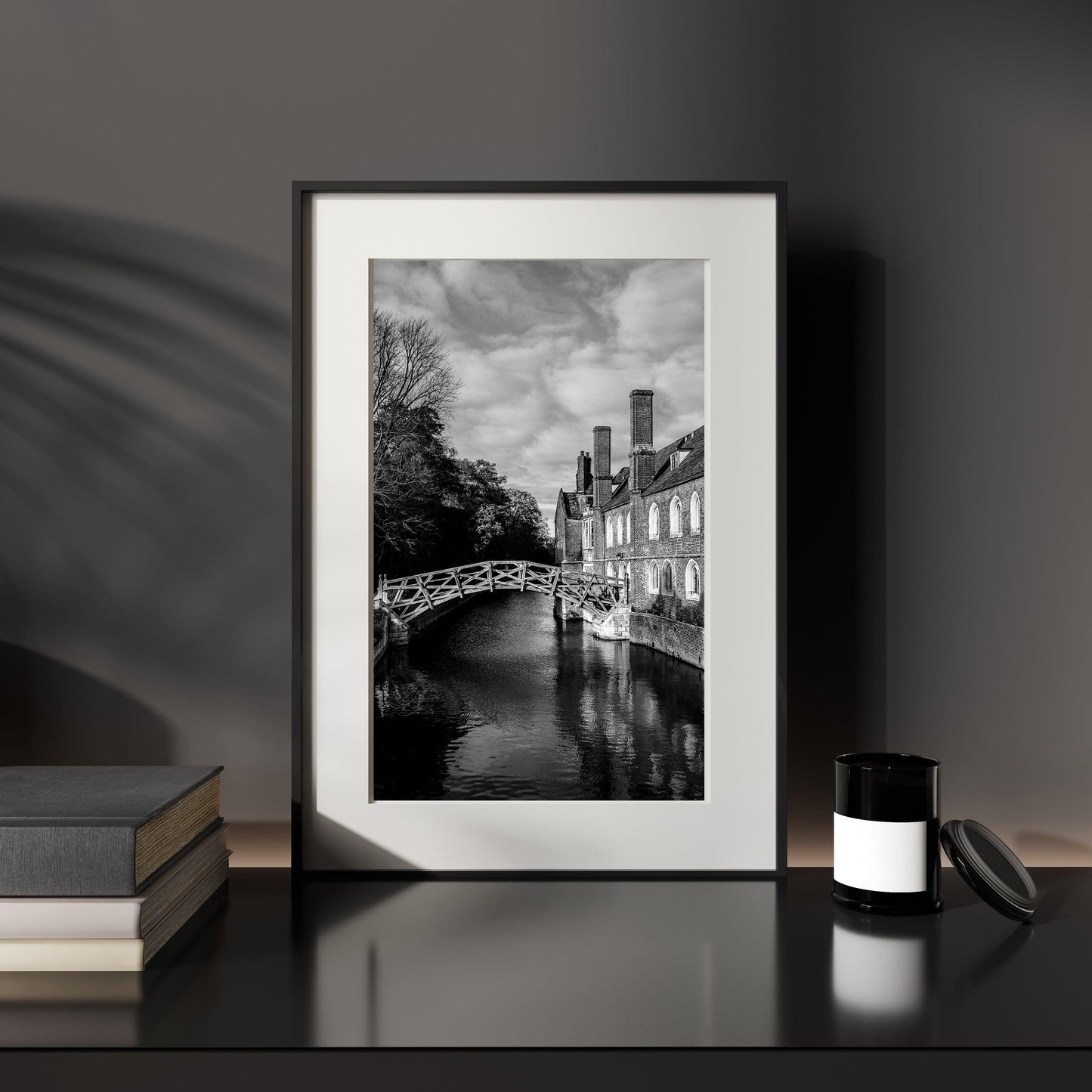 Black and white print of the Mathematical Bridge at the University of Cambridge.