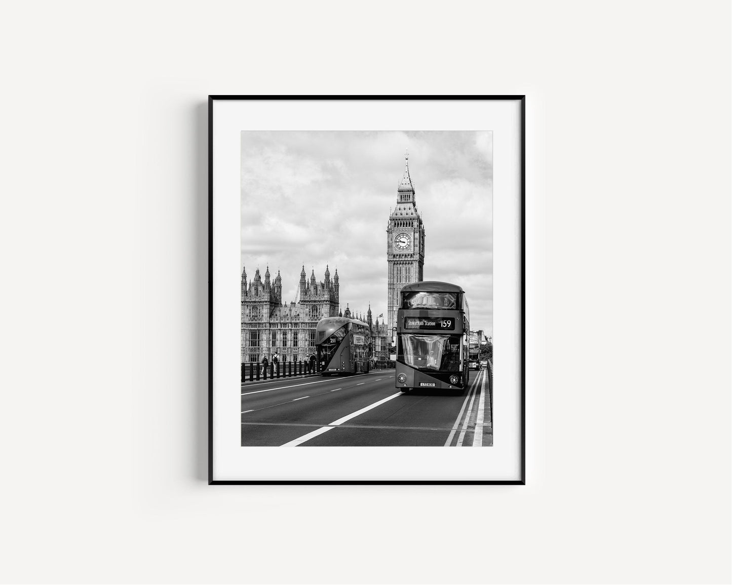Black and white London print featuring Big Ben and a red double-decker bus