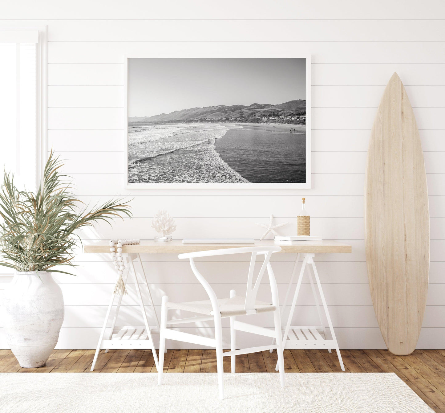 Black and white Santa Monica Beach print featuring soft waves on the shore.