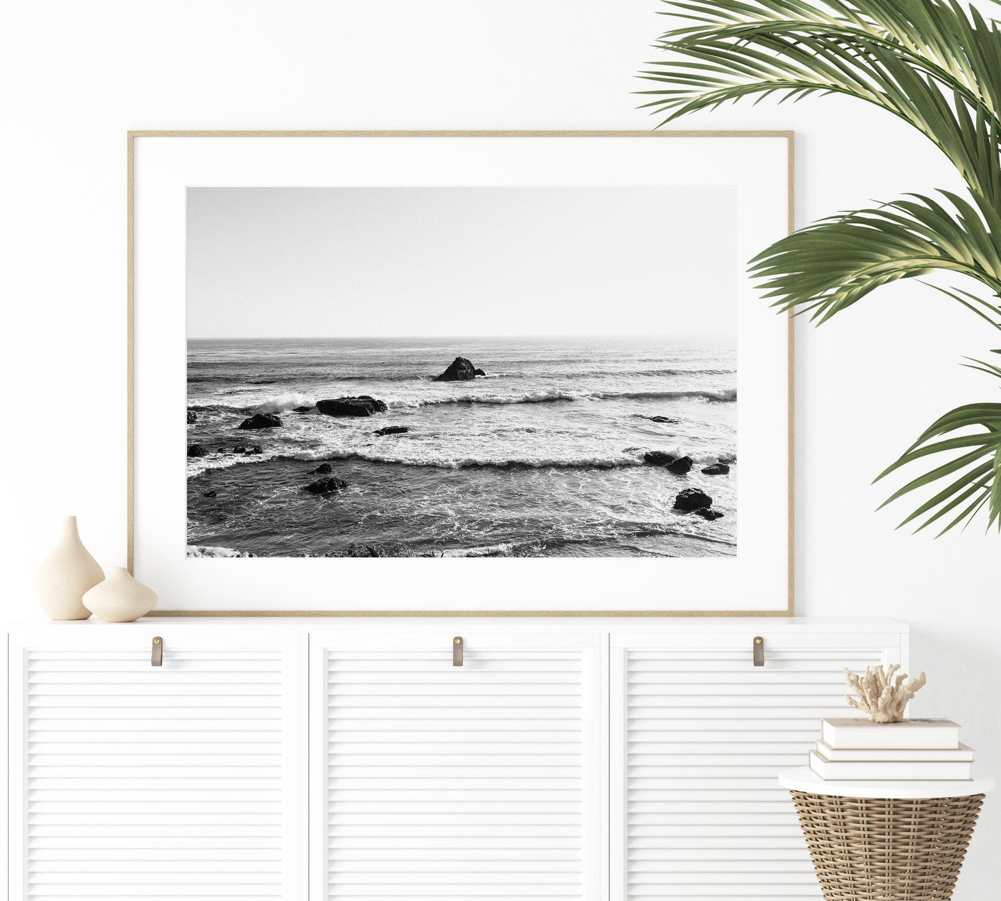 Black and white photo of ocean waves and rock along the California coast – minimalist horizontal wall art