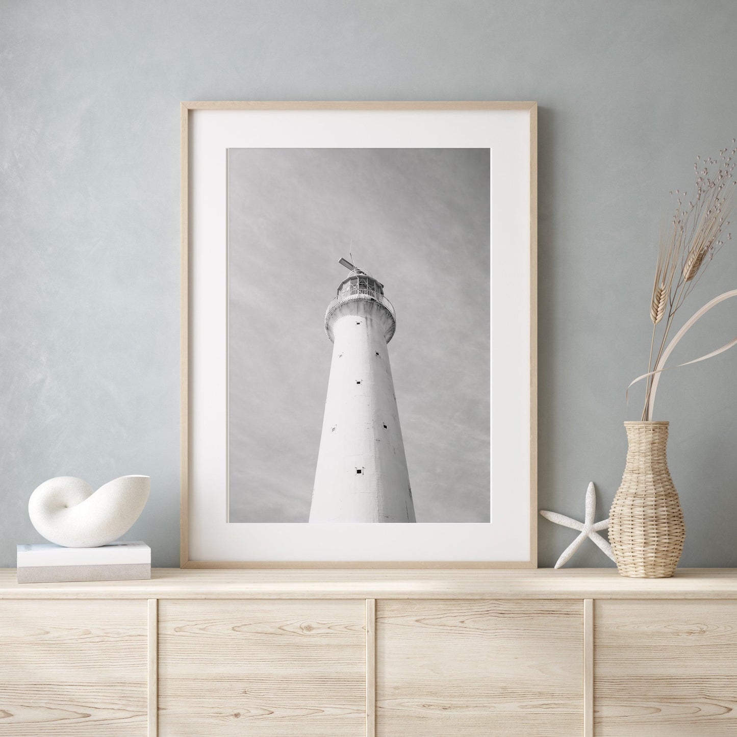 Black and white photo of Gibbs Hill Lighthouse in Bermuda taken from a low angle