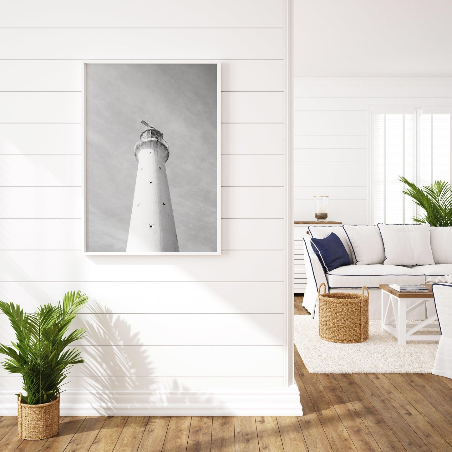 Black and white photo of Gibbs Hill Lighthouse in Bermuda taken from a low angle