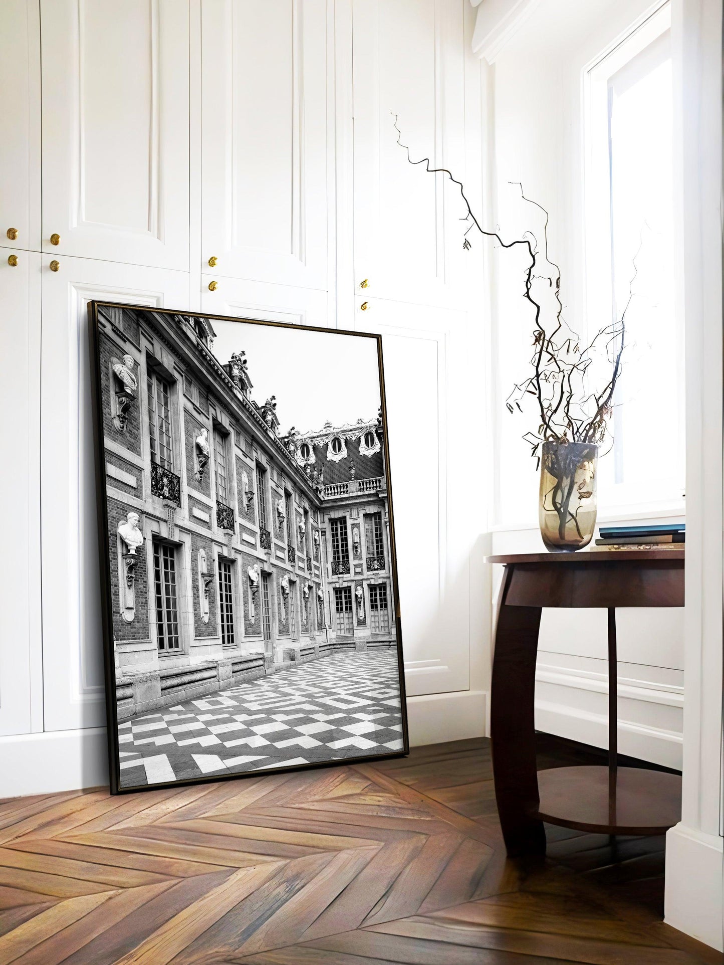 Palace of Versailles captured in black and white photography, showcasing its historic grandeur.