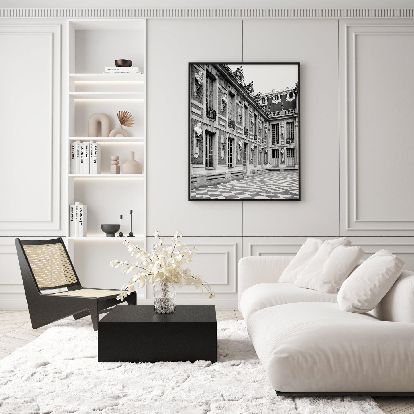 Palace of Versailles captured in black and white photography, showcasing its historic grandeur.
