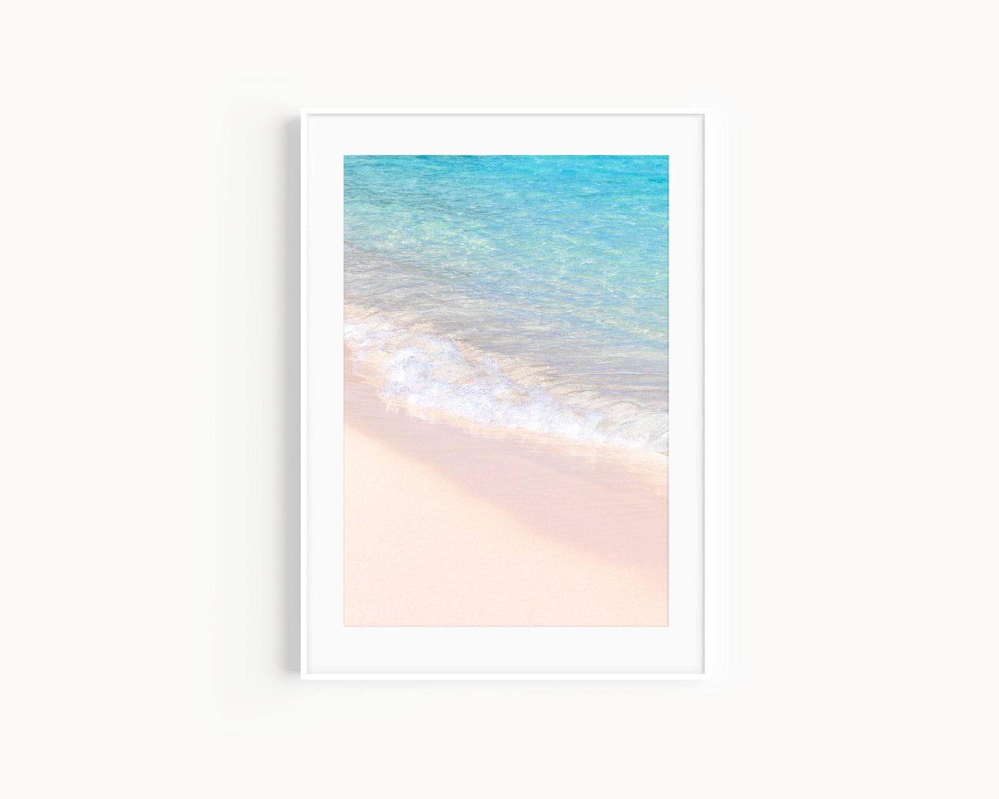 Vertical photo of pink sand and turquoise water at Horseshoe Bay Beach in Bermuda