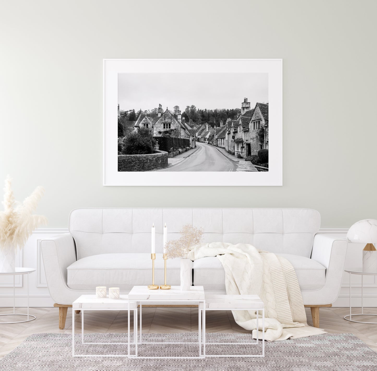 Black and white photo of Castle Combe village in the Cotswolds with old stone cottages and winding road – English countryside wall art