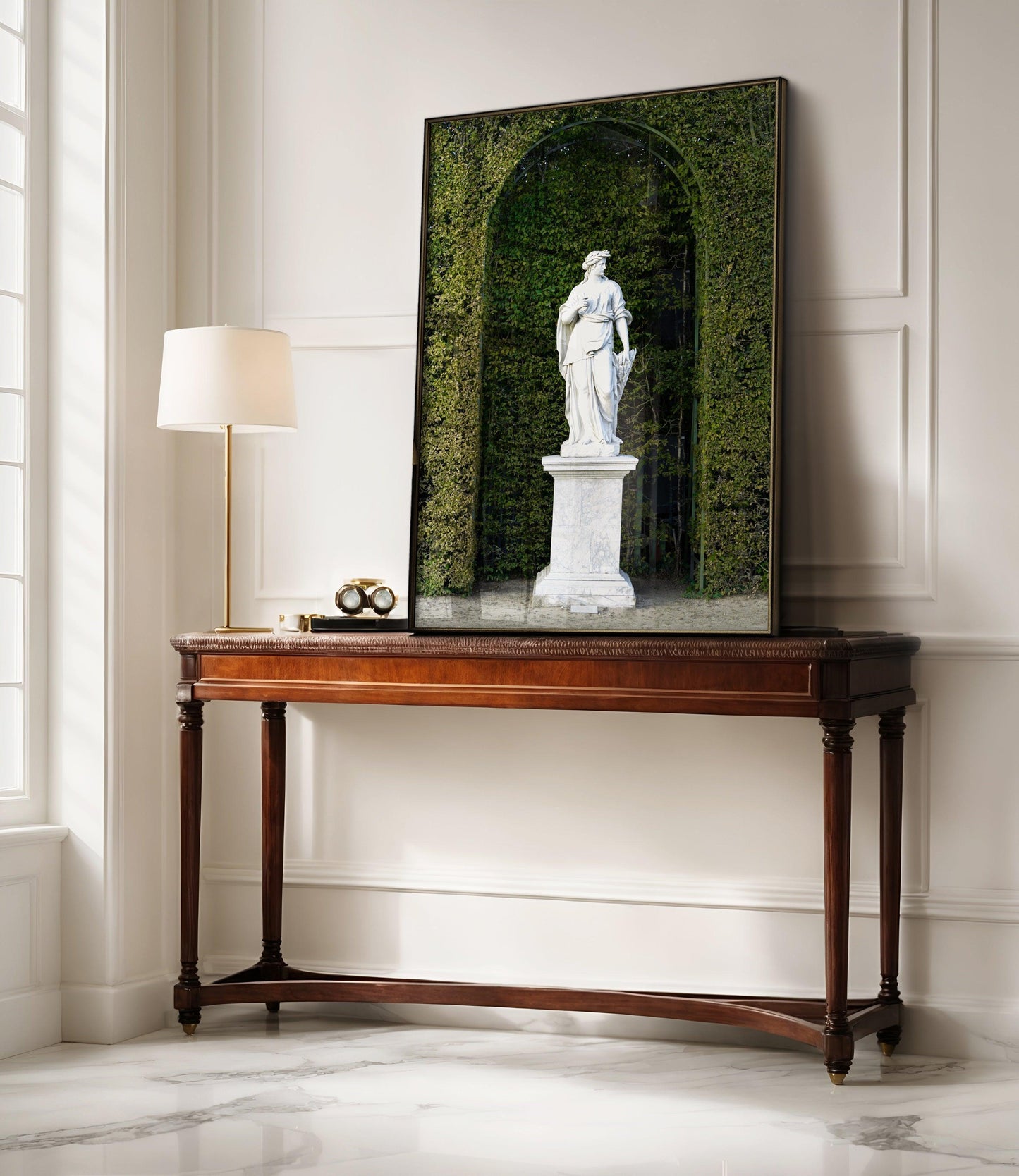 Color photograph of a marble statue in the gardens of the Palace of Versailles, framed by manicured green hedges and soft natural light — ideal for French wall decor, baroque decor, or art for hotel Airbnb.