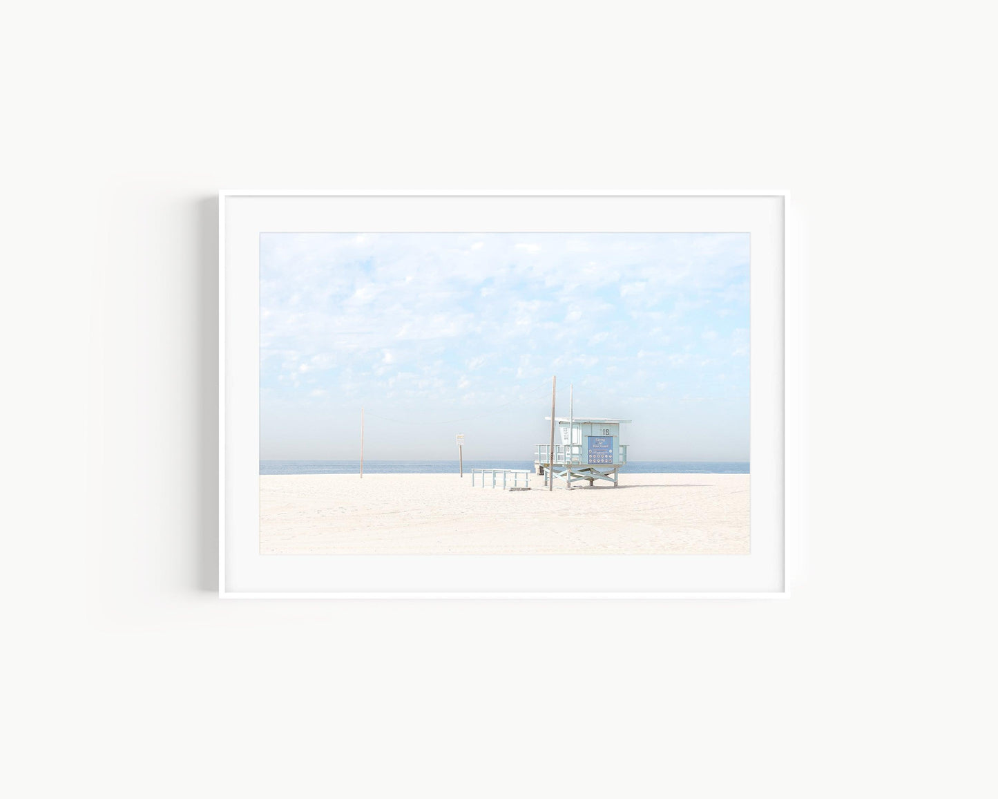 Pastel California beach photo with blue lifeguard tower and soft sand – minimalist coastal wall art