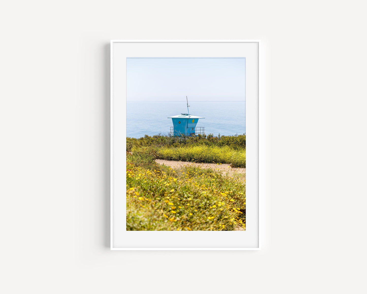 Coastal print featuring the Malibu lifeguard station with vibrant ocean and sky views.