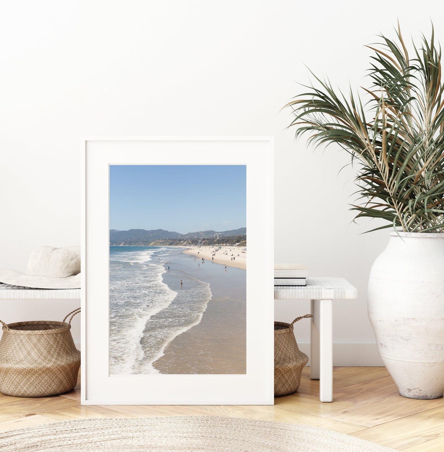 Vertical beach photo of Santa Monica with ocean waves, soft sand, and distant hills – California coast wall art