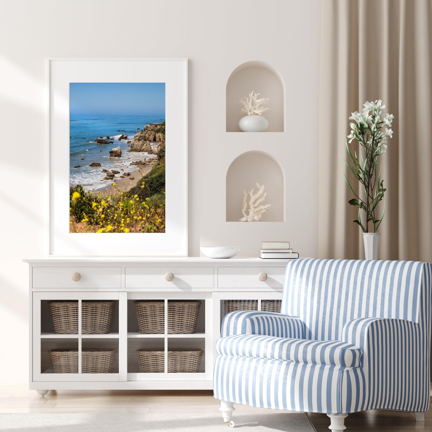 Vertical California coastal photo of El Matador State Beach with yellow wildflowers, rocks, and blue ocean