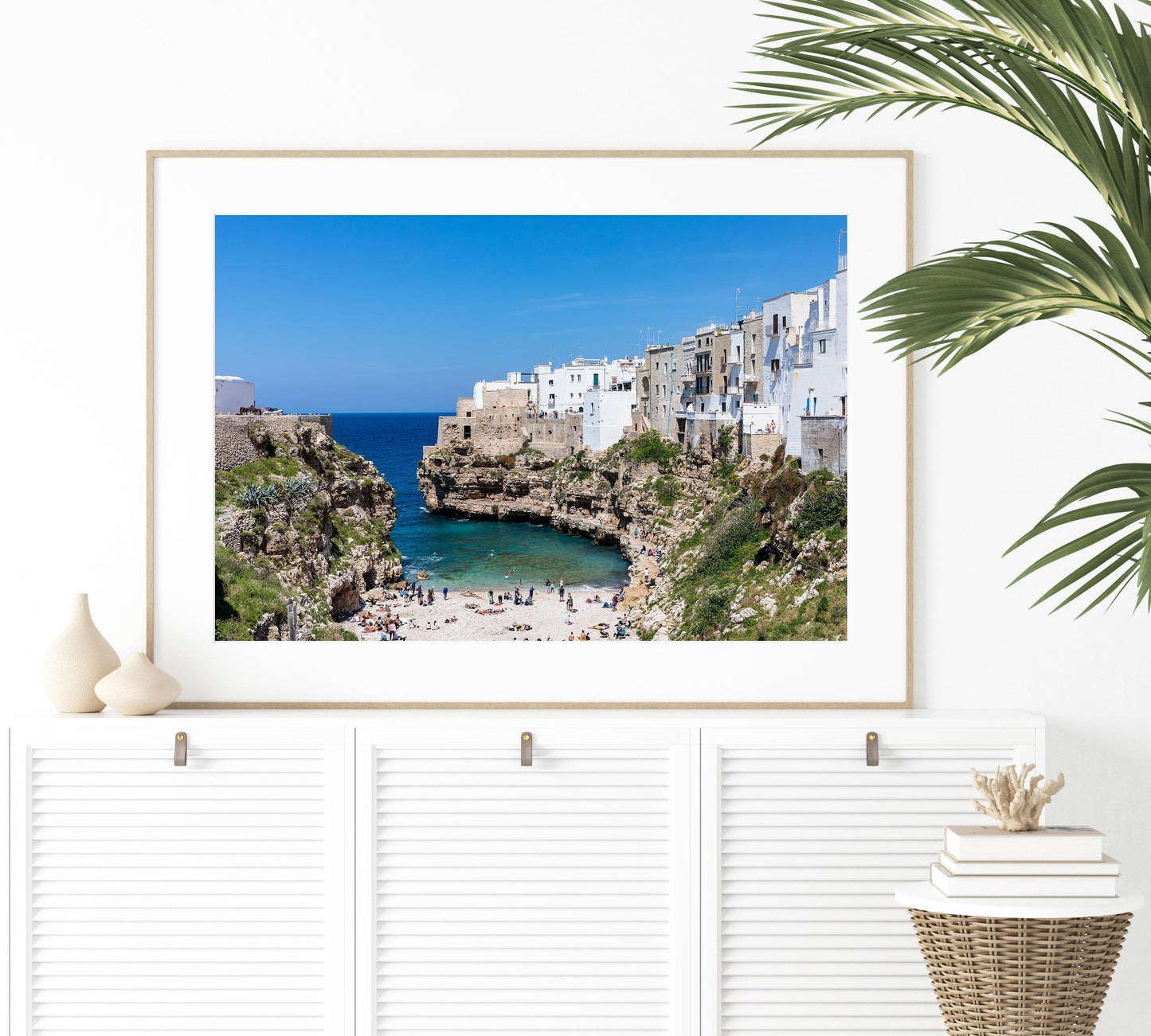 Turquoise waters and limestone cliffs in Polignano a Mare, Italy.