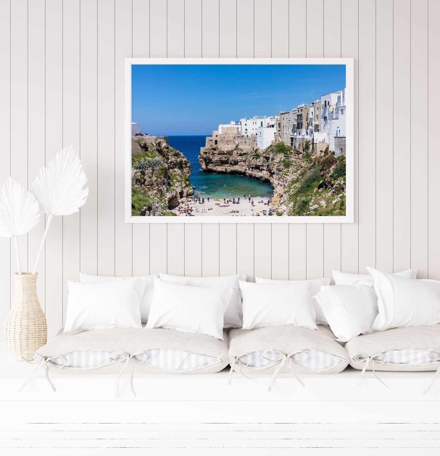 Turquoise waters and limestone cliffs in Polignano a Mare, Italy.