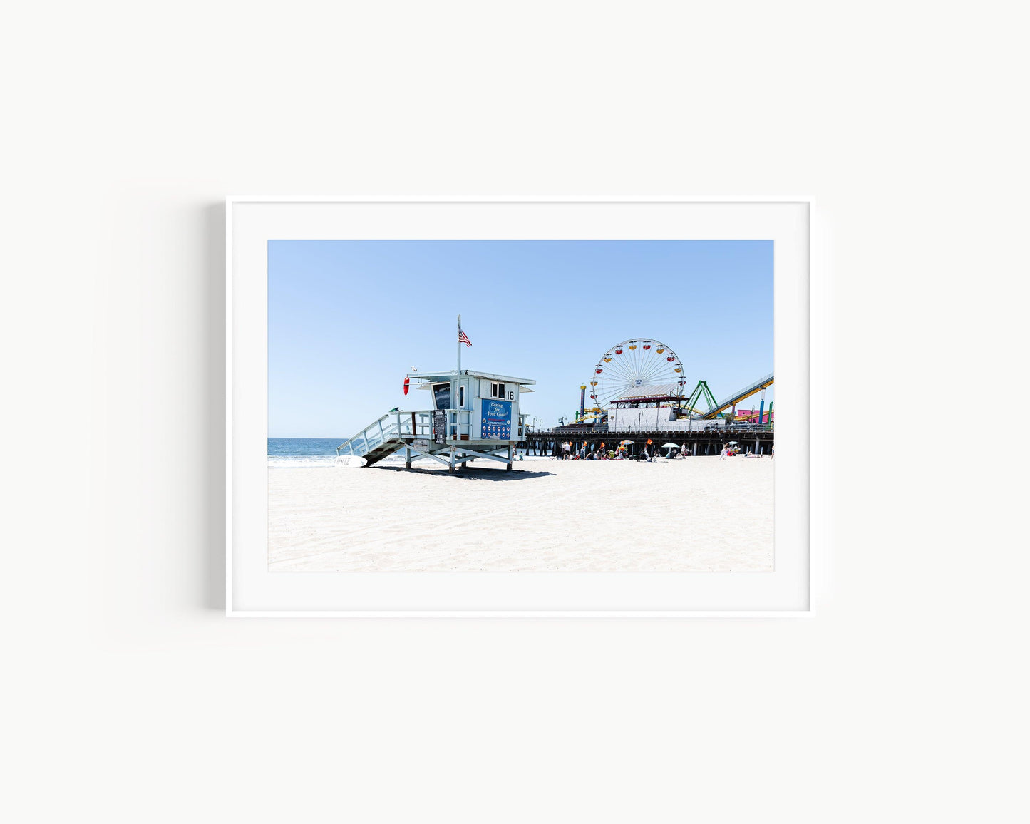 Santa Monica Pier print with Ferris wheel and lifeguard tower, capturing the coastal vibe.