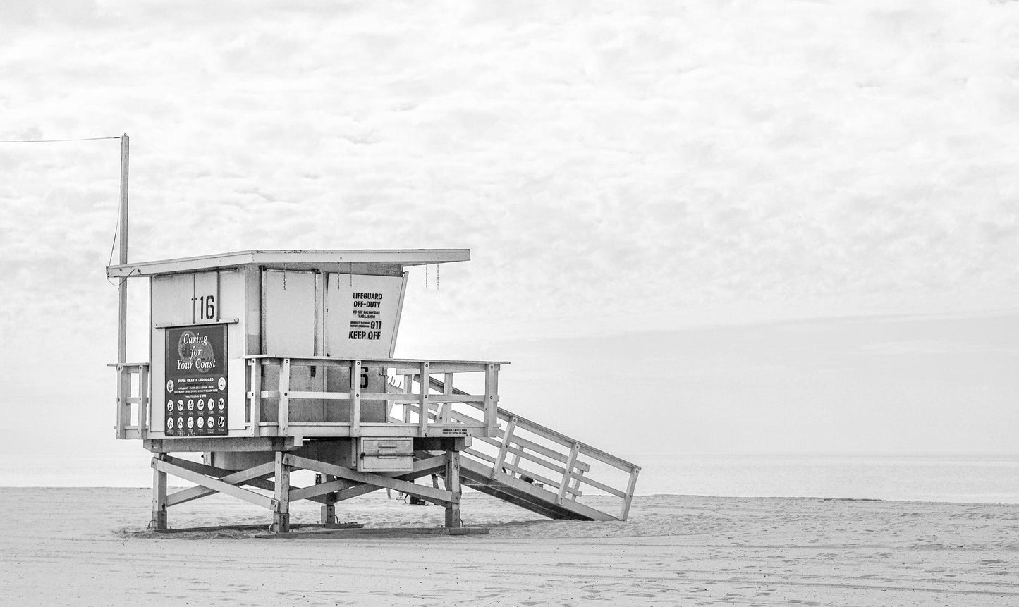 Lifeguard Stand 16 on empty California beach in black and white – minimalist coastal photo print
