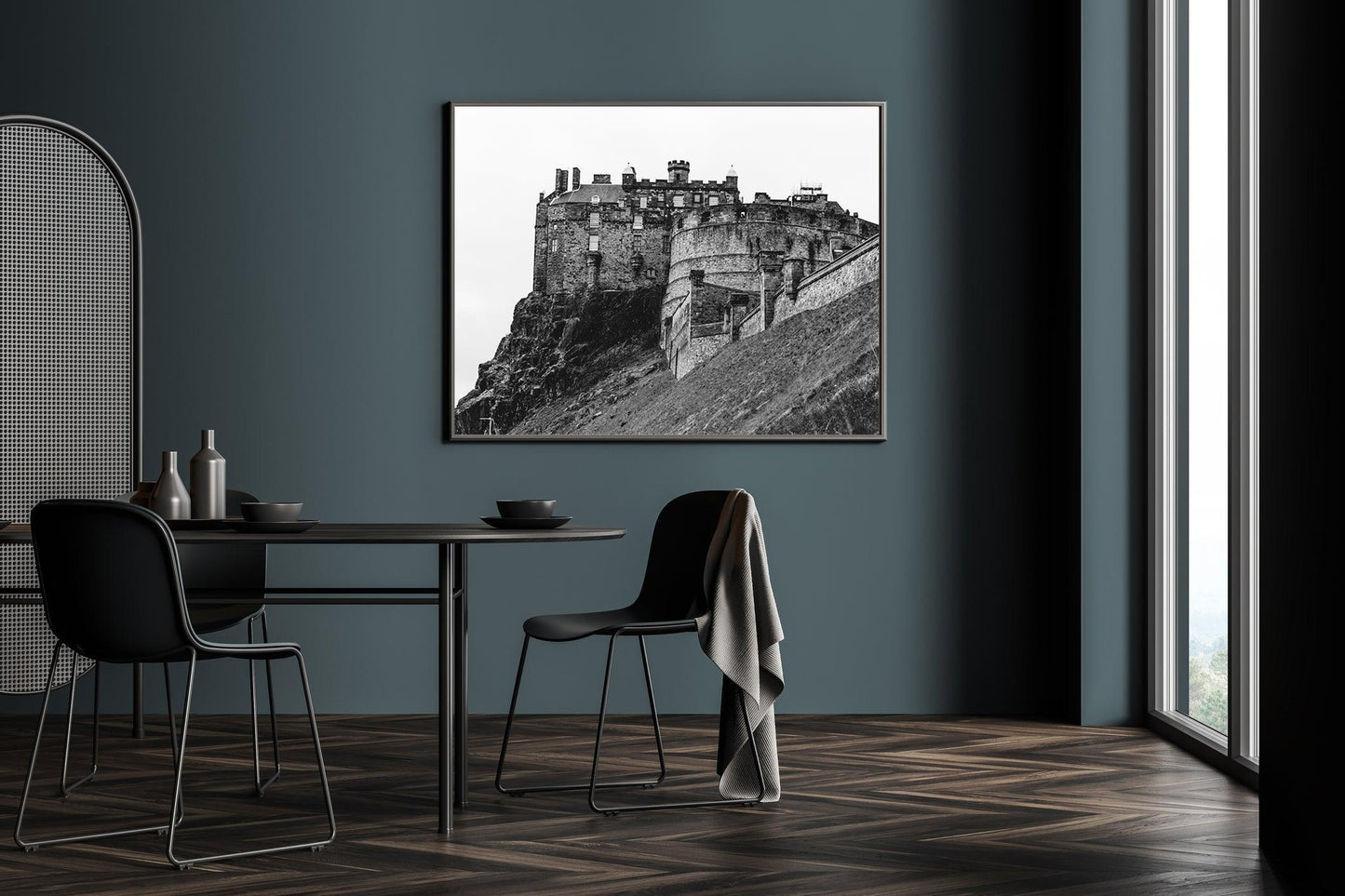 Black and white horizontal photo of Edinburgh Castle in Scotland with stone ramparts and cliffside – moody historic wall art