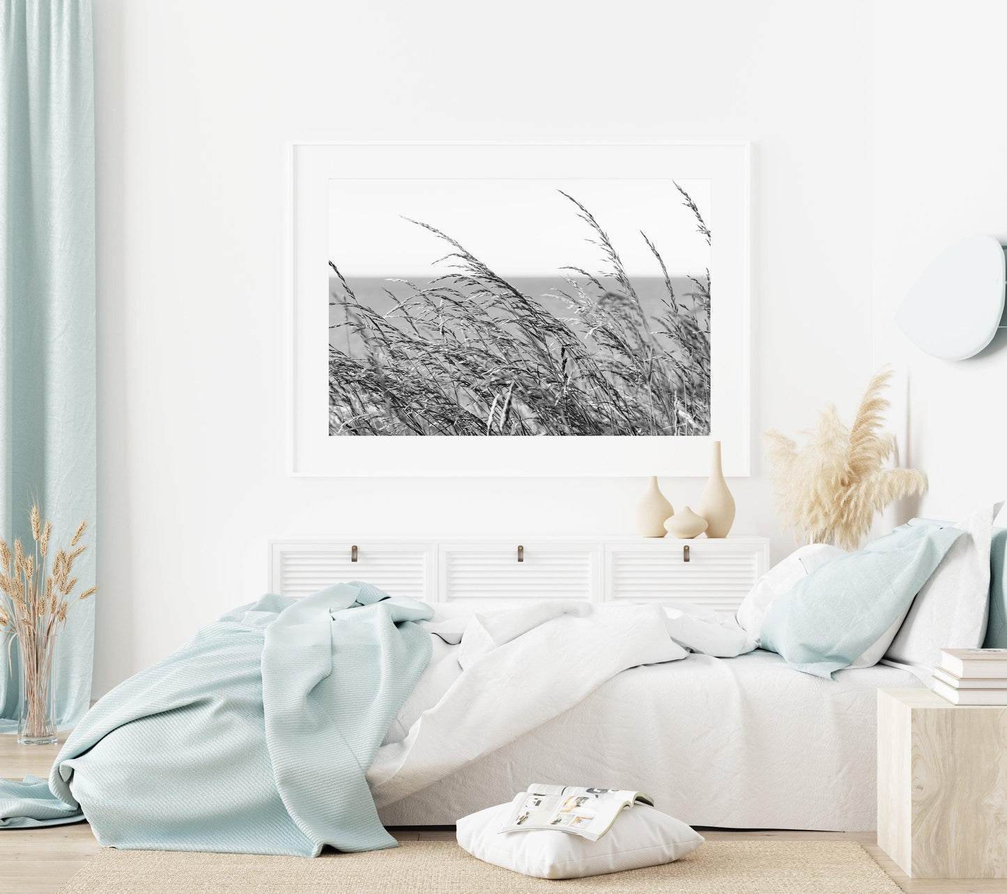 Black and white photo of tall sea oats set against a clear sky, captured on a quiet coastal day near Charleston, South Carolina.