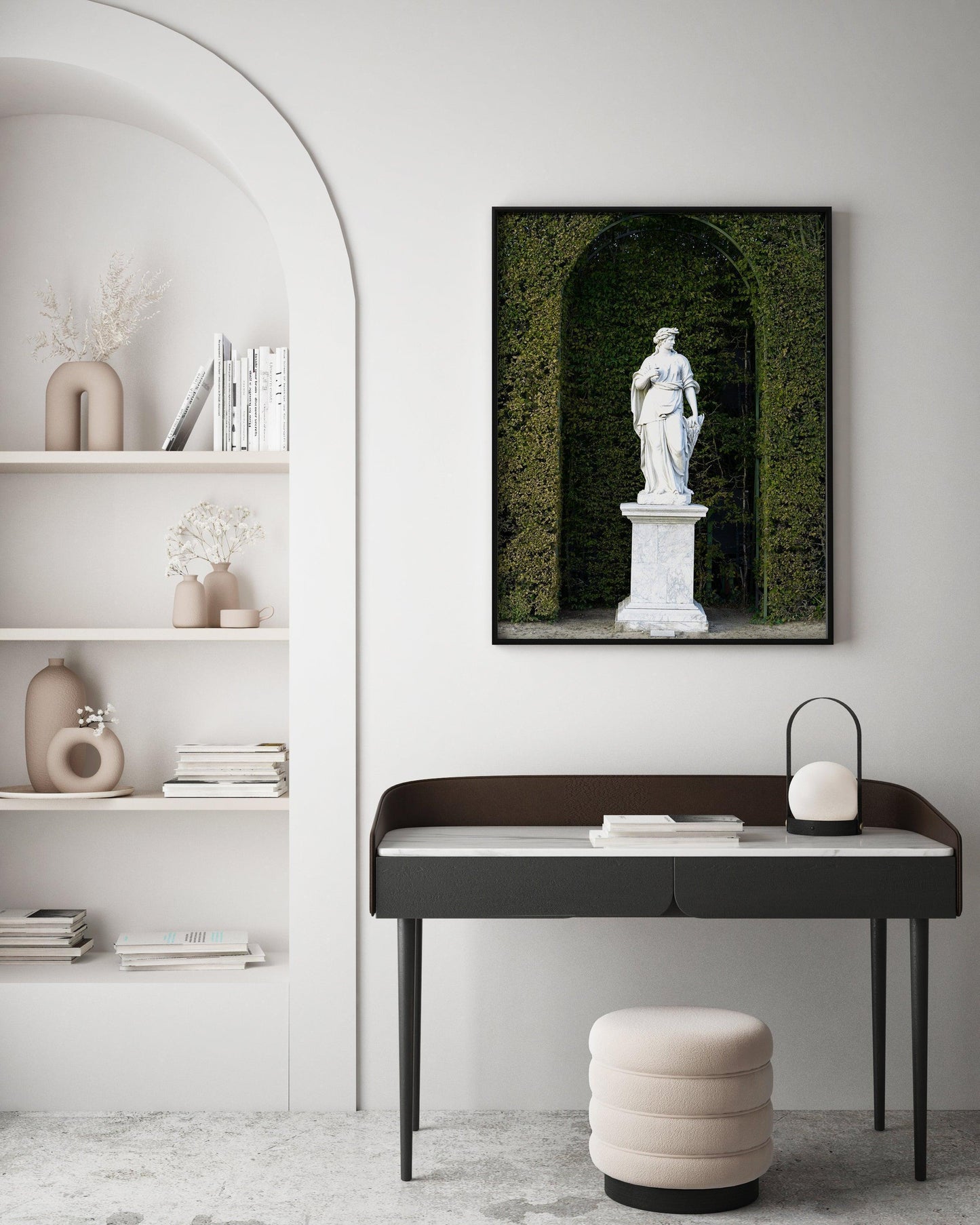 Color photograph of a marble statue in the gardens of the Palace of Versailles, framed by manicured green hedges and soft natural light — ideal for French wall decor, baroque decor, or art for hotel Airbnb.