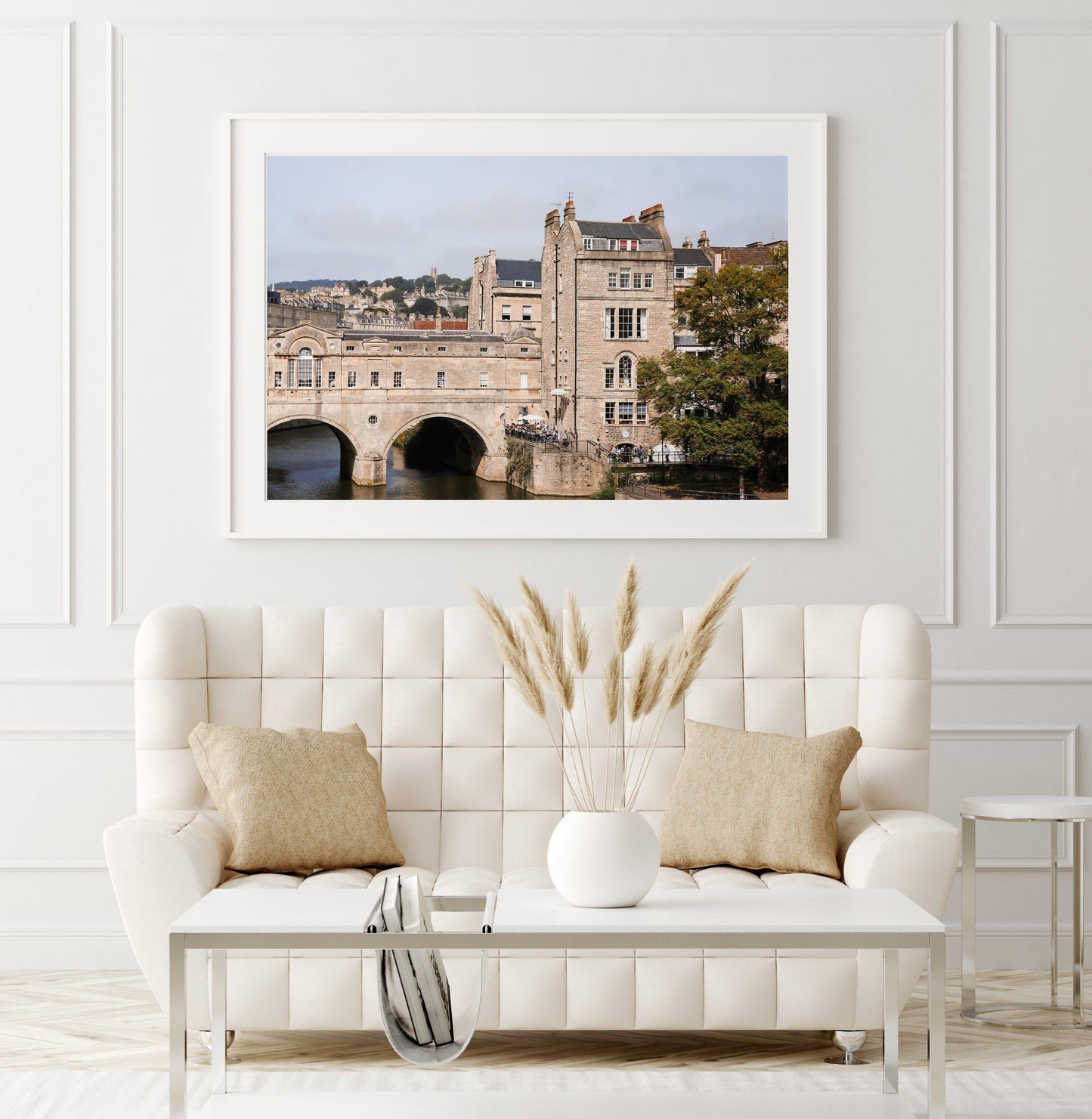 Color photograph of Pulteney Bridge in Bath, England, with historic stone buildings and the River Avon