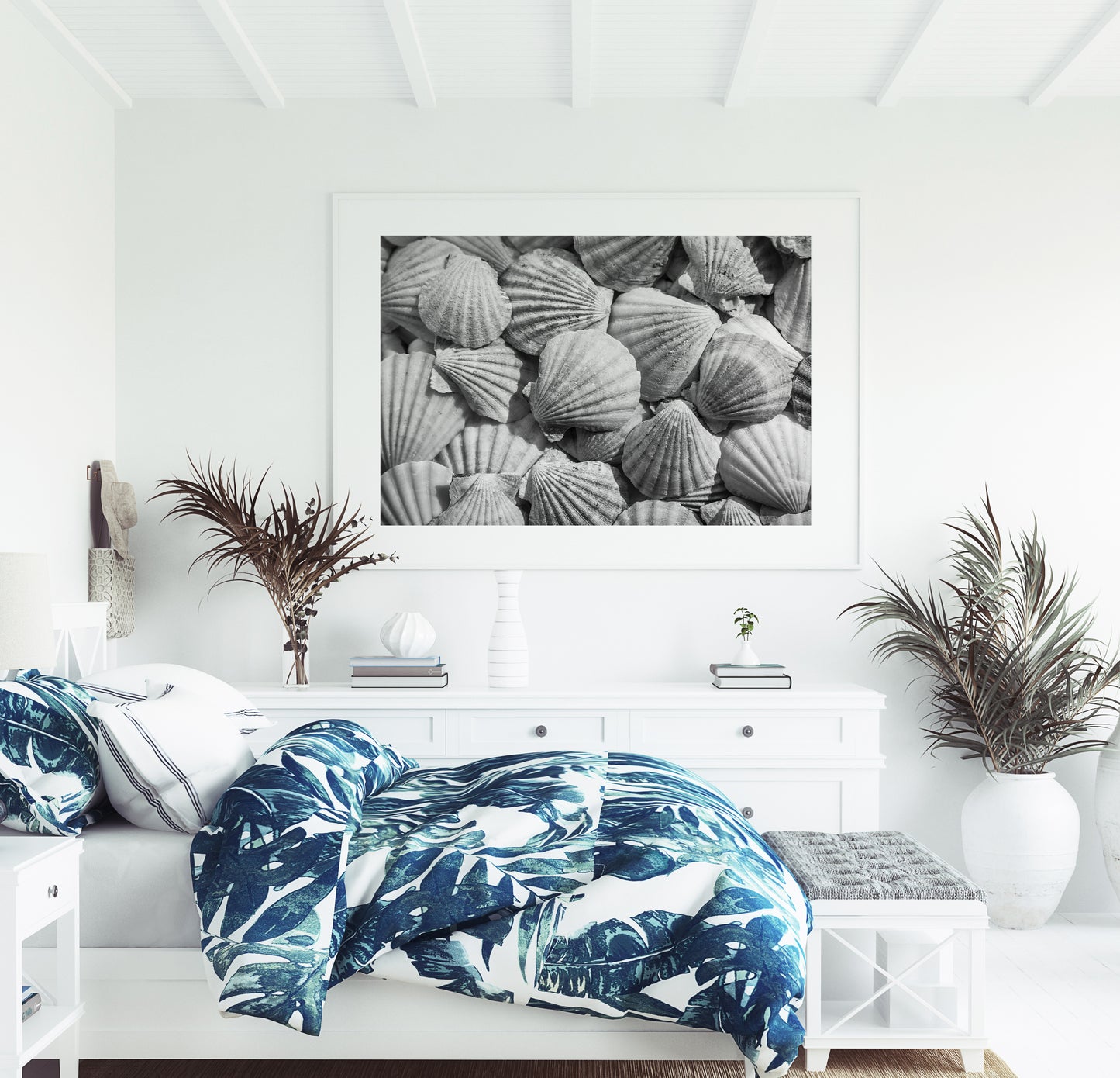 Black and white photograph of seashells arranged closely, creating a textured coastal wall art print.