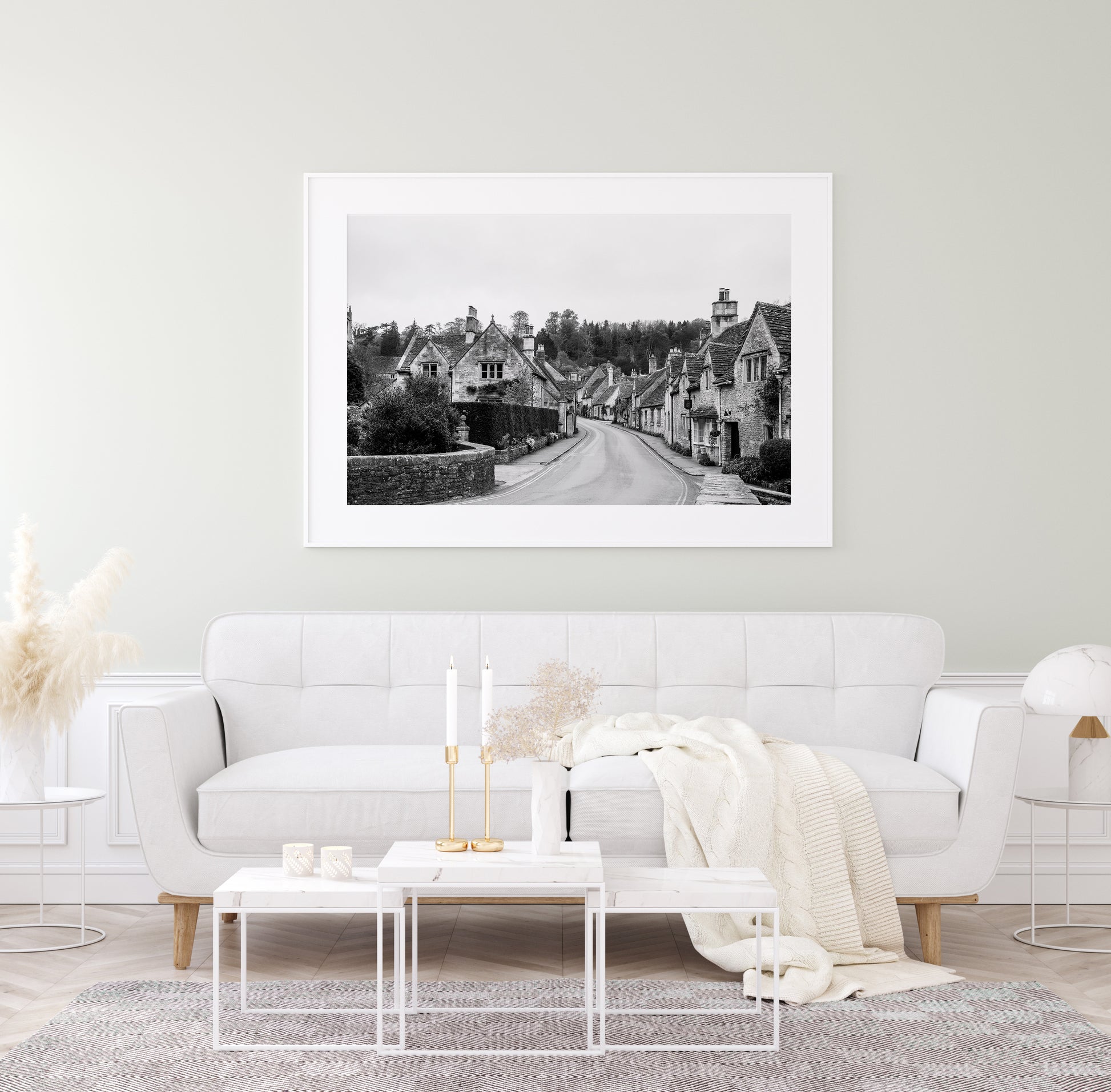 Black and white photo of Castle Combe village in the Cotswolds with old stone cottages and winding road – English countryside wall art