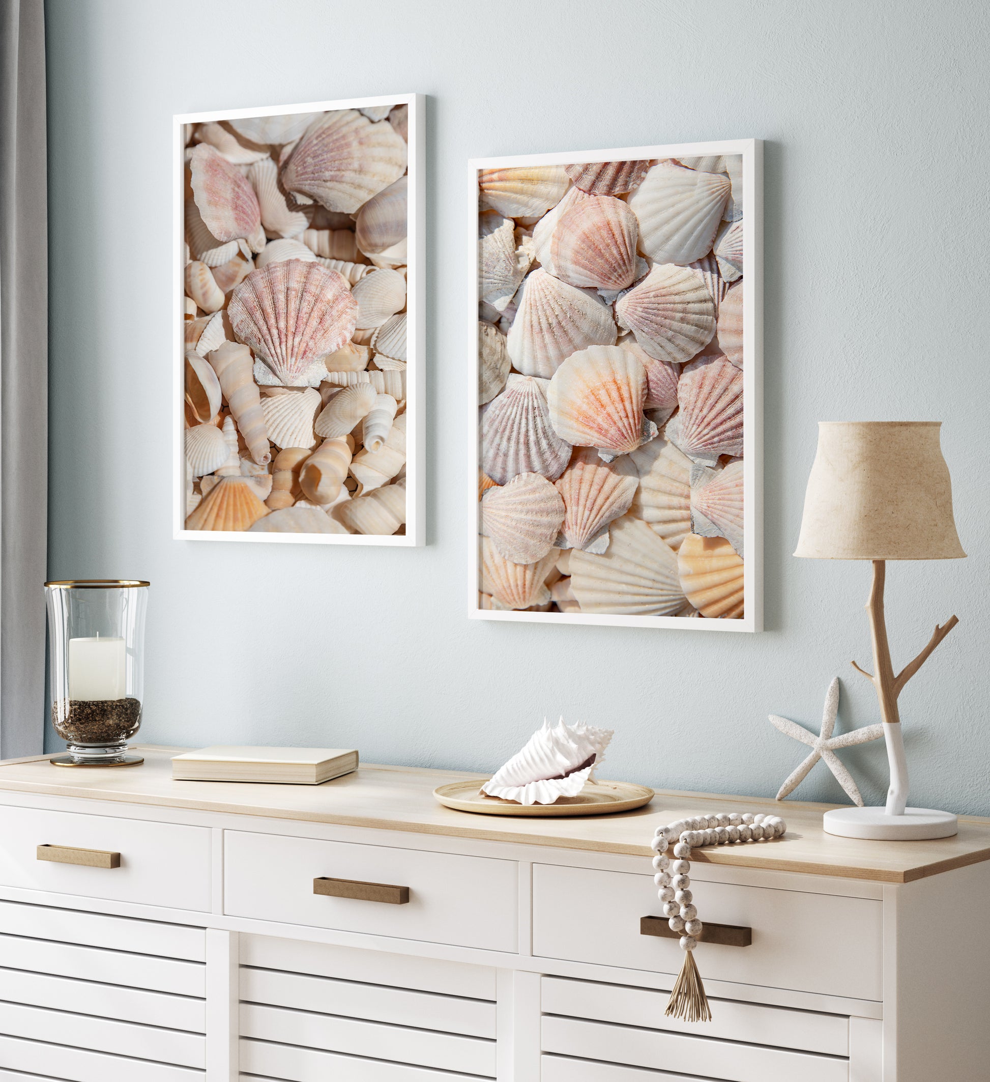 Vertical photograph of neutral-toned seashells with soft lighting and pastel shades — coastal wall art with a minimalist beach house aesthetic.