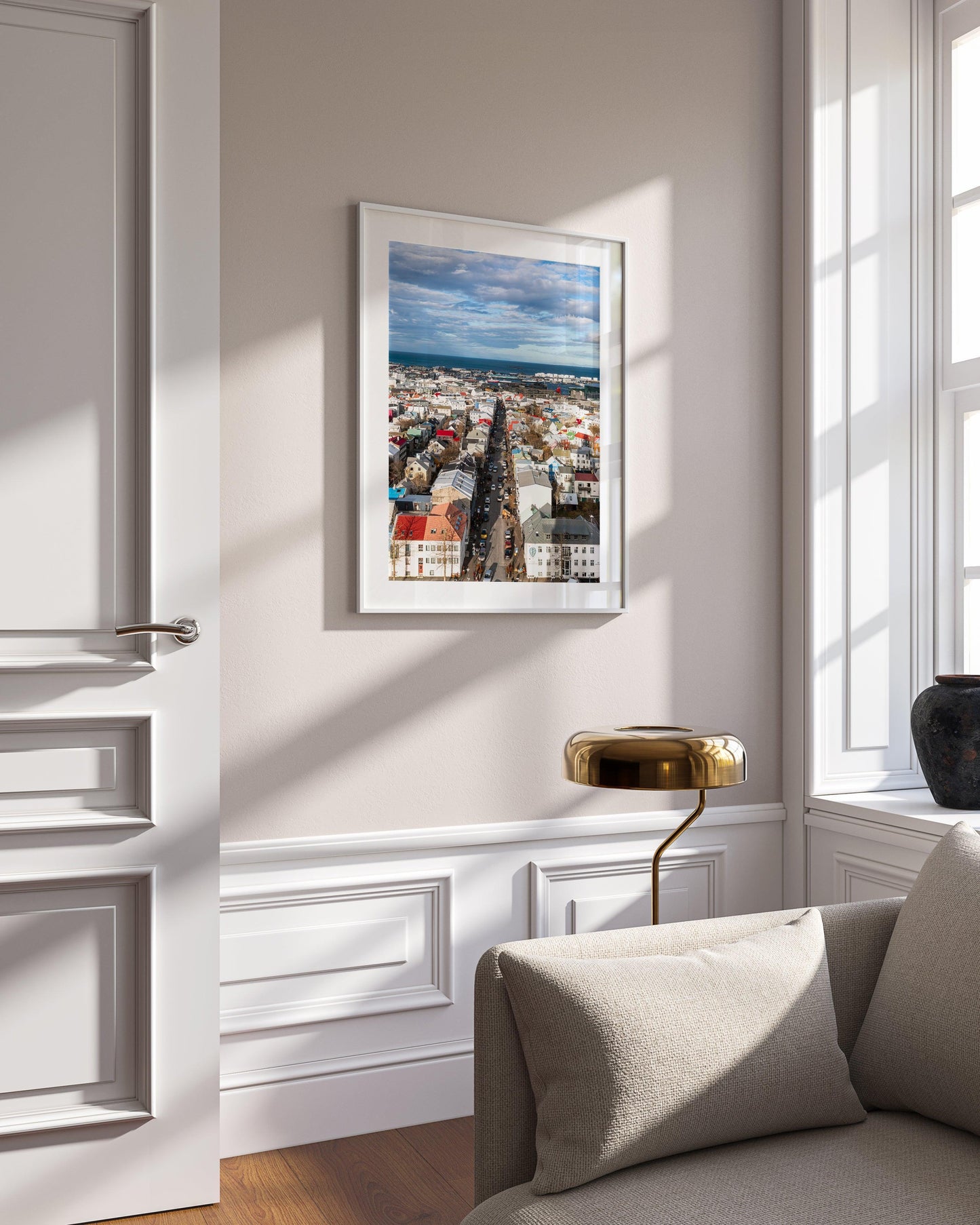 Colorful Reykjavik skyline on a clear day, showing a Nordic cityscape with vibrant rooftops, downtown buildings, and the North Atlantic in the background. Vertical Iceland photography print.
