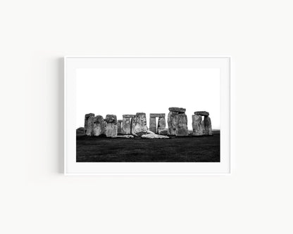 Black and white horizontal photo of Stonehenge with ancient stones against a cloudy sky – minimal neutral wall art