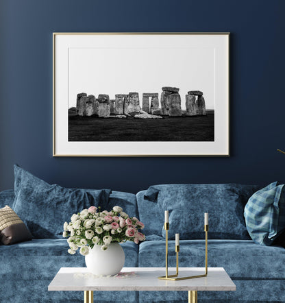 Black and white horizontal photo of Stonehenge with ancient stones against a cloudy sky – minimal neutral wall art